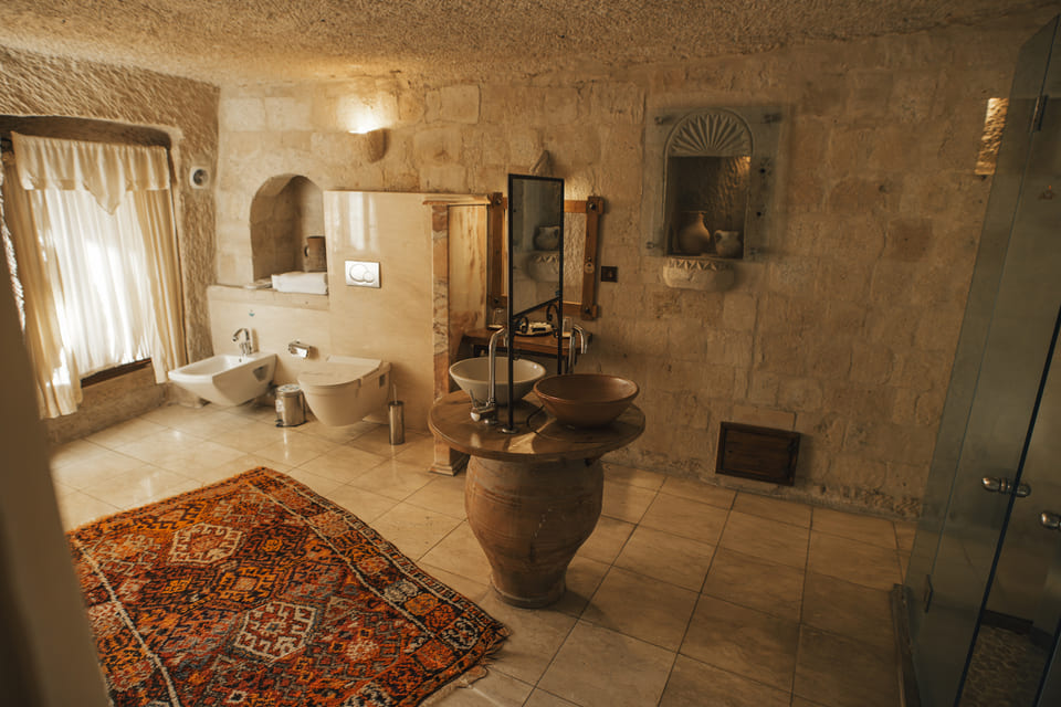 The suite bathroom, carved into the rock