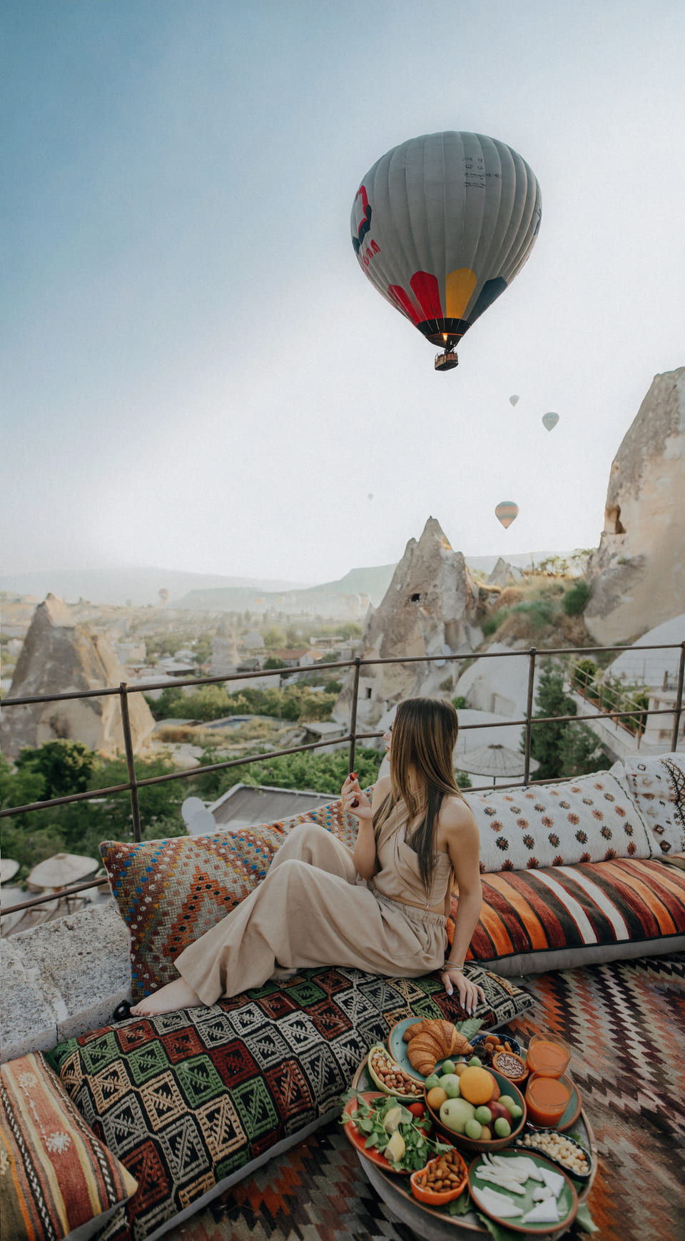 Cushions on the balloon terrace, looking over Göreme