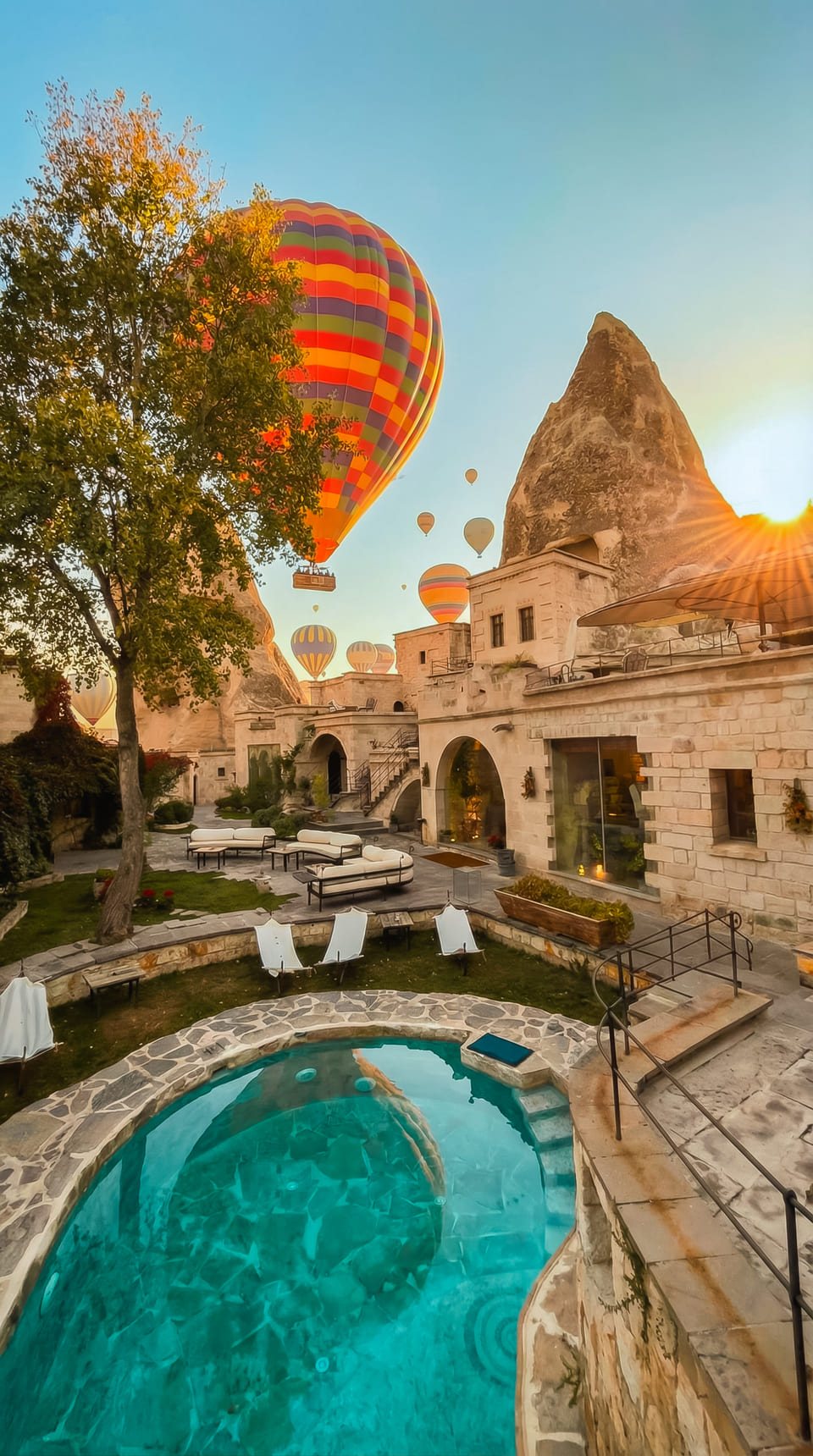 Balloons above the pool at sunrise