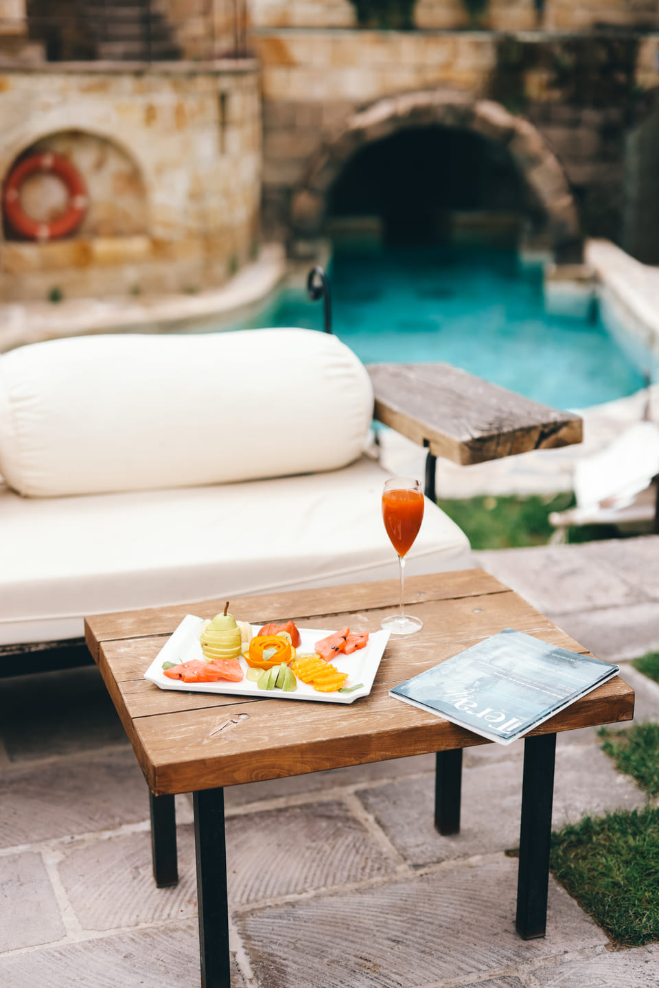 Poolside table and daybed