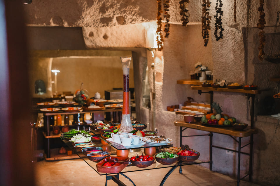 The breakfast table inside the cave hall