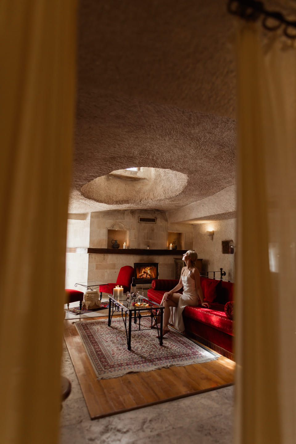 The sitting room of a suite, beside the fireplace